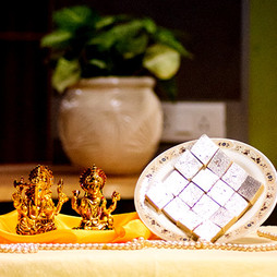 Laxmi Ganesha Idol with Kaju Katli