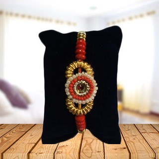 Round Pearl and Golden Rakhi