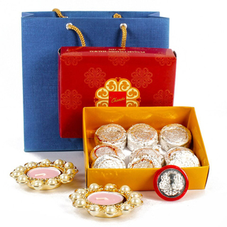 Kaju Pista Sweets with Coin and Diyas