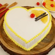 Exclusive Heart Shape Pineapple Cream Cake
