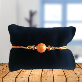 Om Orange Rakhi