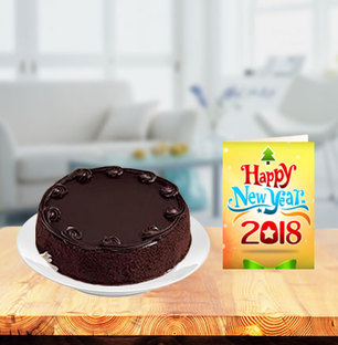 New Year Chocolate Cake with New Year Greeting Card