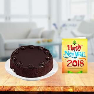 New Year Chocolate Cake with New Year Greeting Card