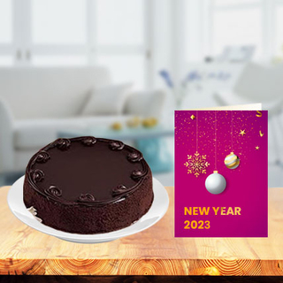 New Year Chocolate Cake with New Year Greeting Card
