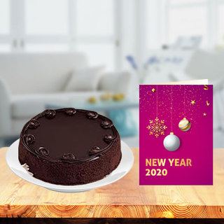 New Year Chocolate Cake with New Year Greeting Card
