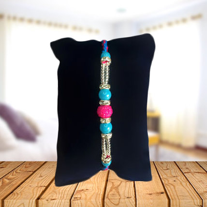 Blue Beads with Pink Rakhi