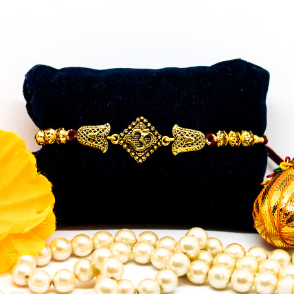 Exquisite OM Golden Rakhi