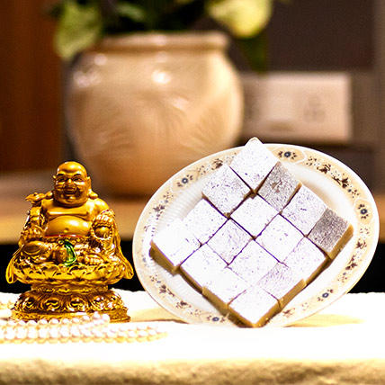 Kaju katli and Laughing budha Idol