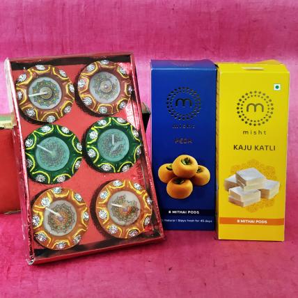 Beautiful Diwali Diyas with Sweets