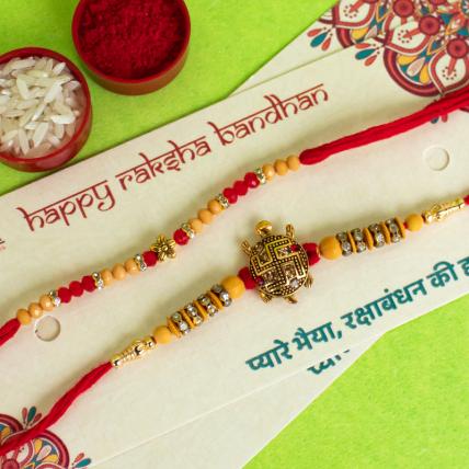 OM Swastika OM Pearl Rakhi Set
