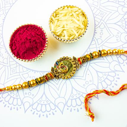 Beautiful Golden Ganesha Rakhi