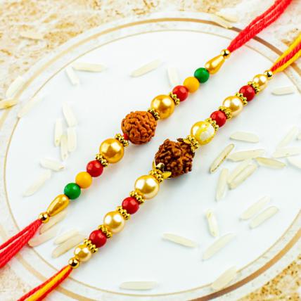 Stone OM Pearl Rakhi Set