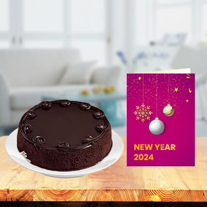 New Year Chocolate Cake with New Year Greeting Card
