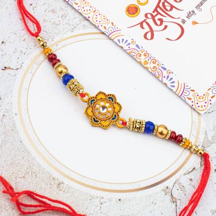 Round Pearl and Golden Rakhi