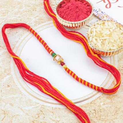 Elegant Round Pearl Rakhi