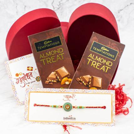 Round pearl rakhi with Almond and chocolates in heart shape box