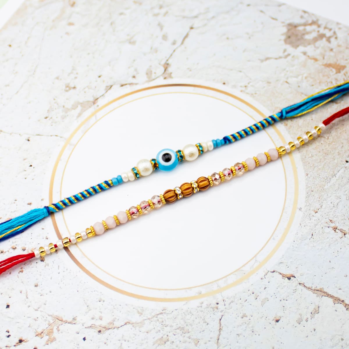 Colourful OM Leaf Rakhi Set