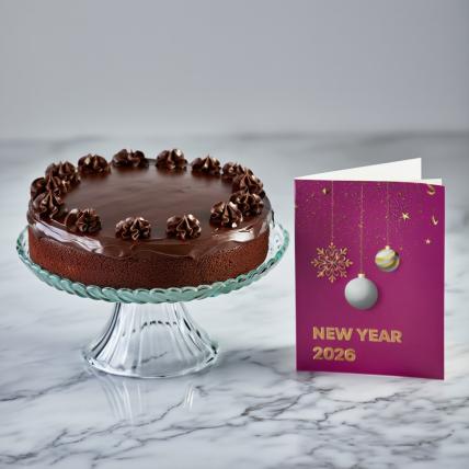 New Year Chocolate Cake with New Year Greeting Card