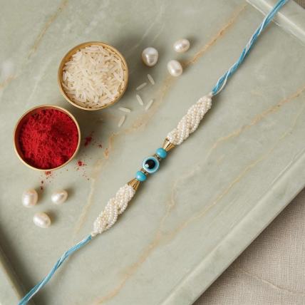 Elegant Blue Evil Eye Pearl Rakhi